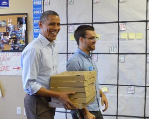 Obama livreaza pizza inainte de alegeri