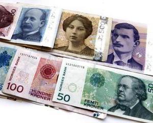Coroana norvegiana, rubla si zlotul s-au facut mici in fata euro